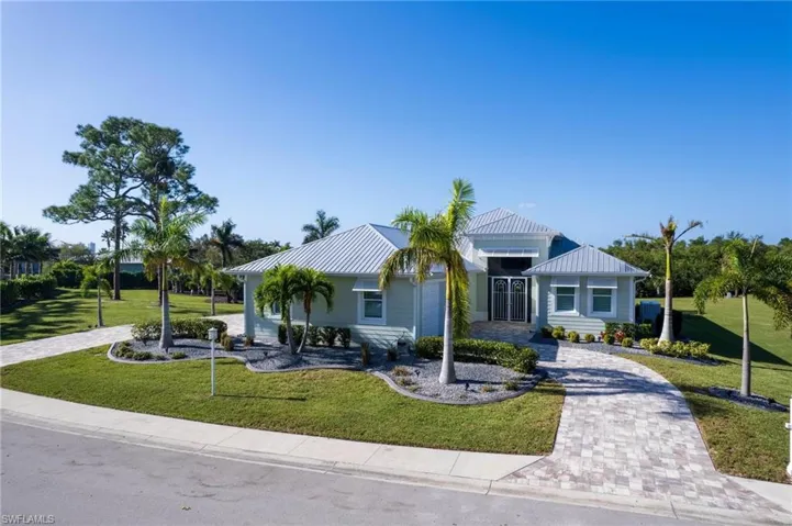View of front of house with a front lawn