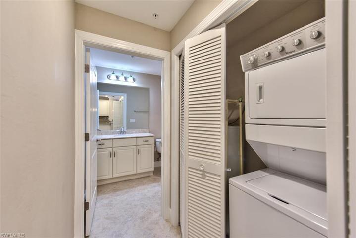Guest bathroom with laundry area