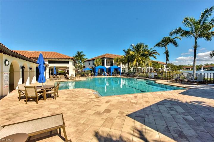 Resort style pool with cabanas and grills