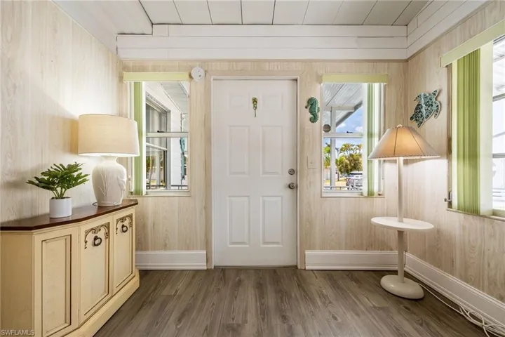 Front entrance enters into the den area.