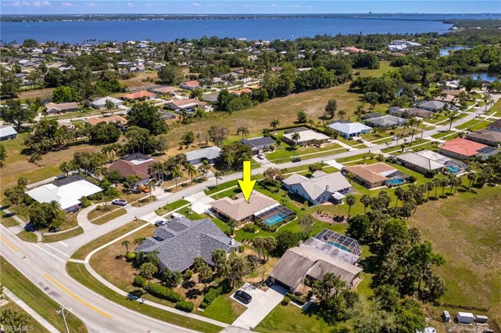 Drone / aerial view featuring a residential view and a water view