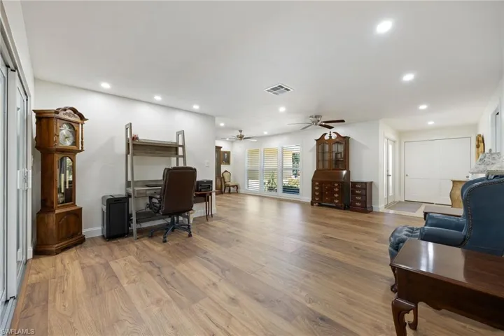 Office featuring a ceiling fan, recessed lighting, and light wood-type flooring