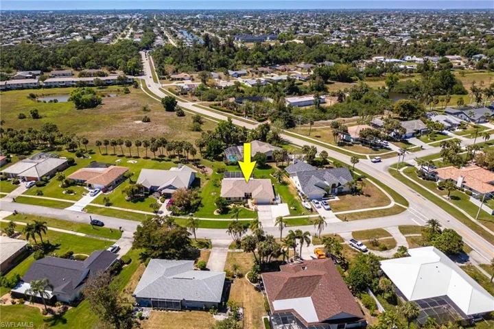 Birds eye view of property with a residential view