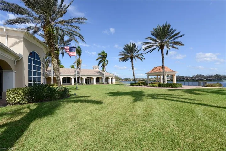 View of yard with a gazebo and a water view