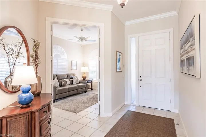Foyer leads to den and great room.