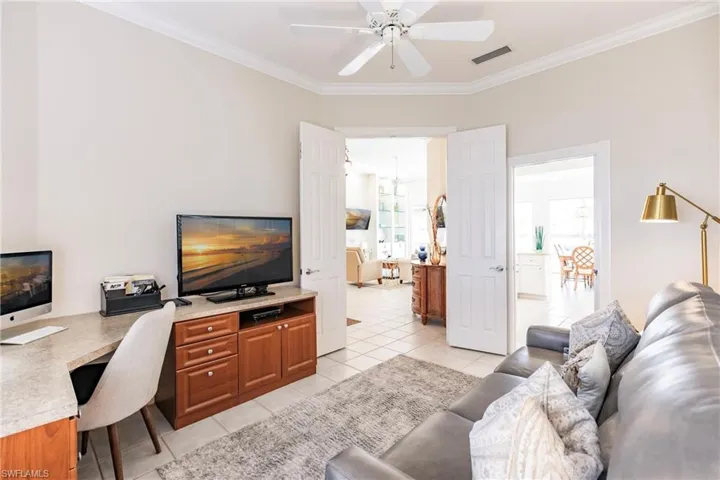 French doors into den and also a pocket door leading to the kitchen.