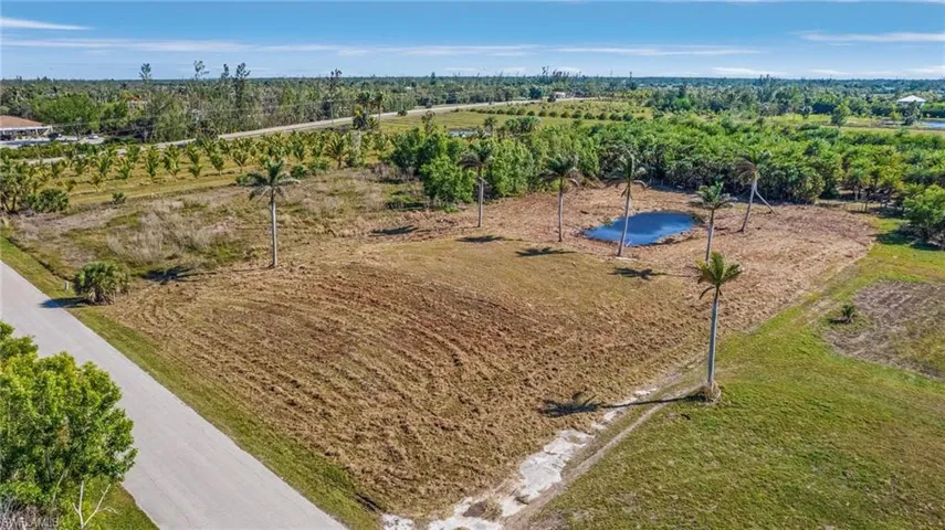Looking SouthEast.  Building Pad already in place.