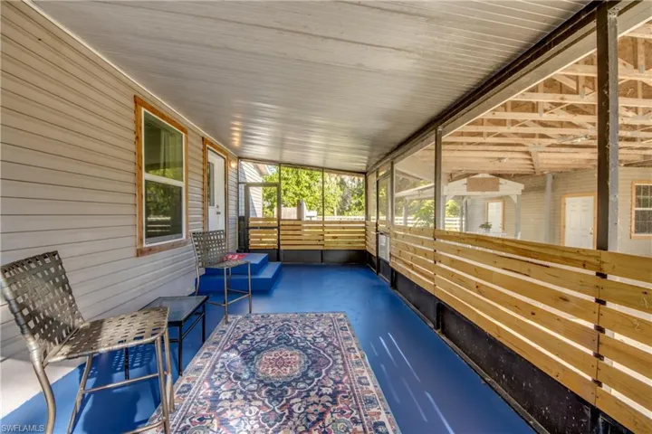 Sunroom with an outdoor hangout area
