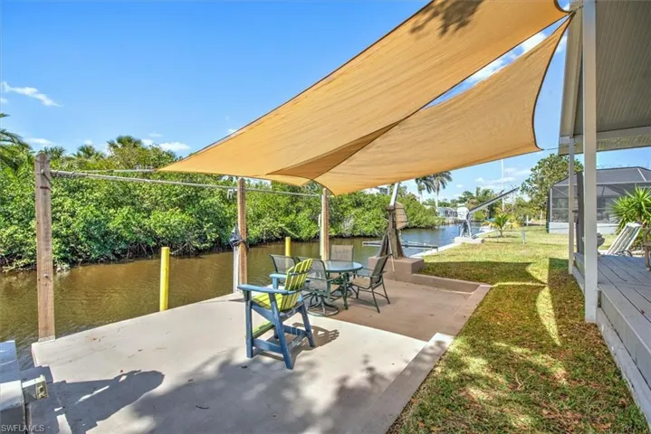 View of patio / terrace featuring a water view