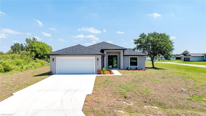 Amazing New Construction 4 Bedroom/3 Bath/2 Car Home On .62 Of An Acre And Sides On A Preserve Home In Lehigh Acres On City Water And Sewer!