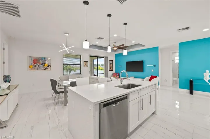 Gorgeous Kitchen with Stainless Steel Appliances and Quartz Countertops