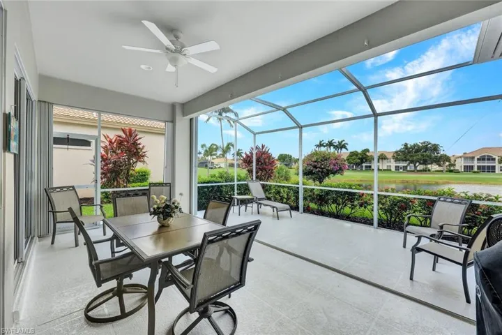Sunroom featuring ceiling fan
