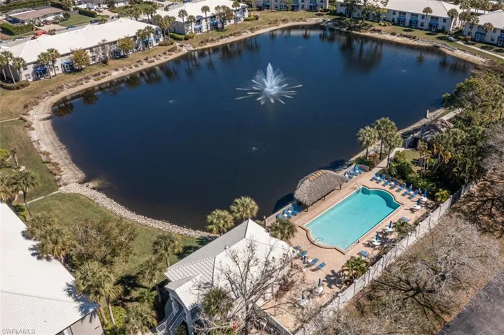 Aerial view of a large body of water and a pool area