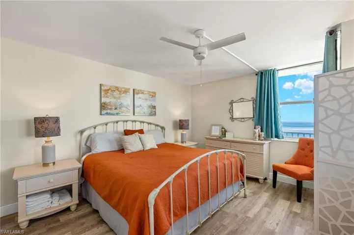 Bedroom with light wood-type flooring and ceiling fan