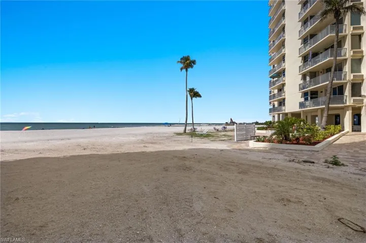 View of water feature featuring a beach view