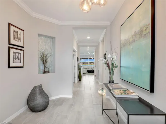 Bright foyer with custom lighting