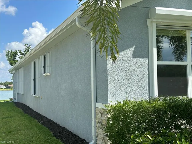 Built-in Hurricane shutters and gutters