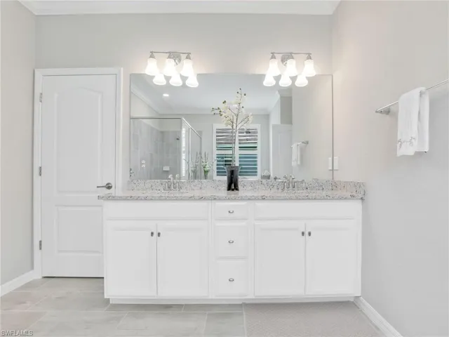 Primary Bath with dual sinks and private toilet room