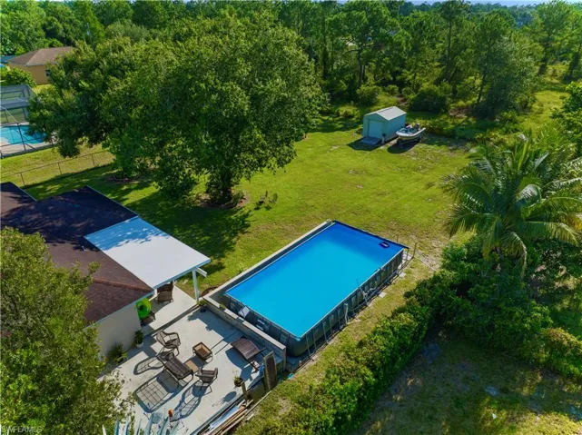Drone / aerial view of a pool area