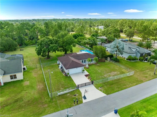 View from above of property with a heavily wooded area