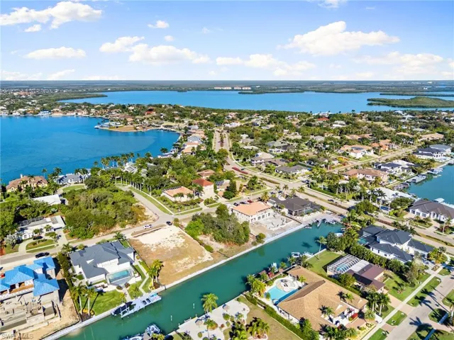 Aerial view of residential area with a nearby body of water