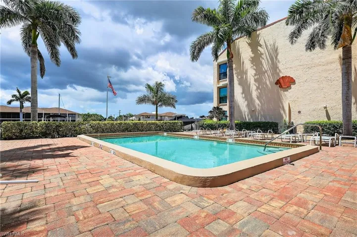 Community pool has water views. large patio area and is heated