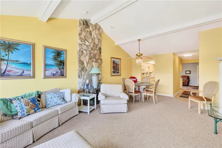 From this picture you get an idead of how big this room is. It is rare to have 2 different areas to lounge in in a condo. This family room & the front living room