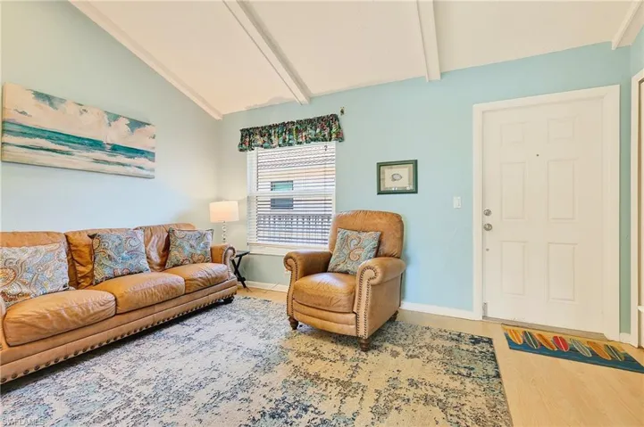 As you walk in the front door you will find this cozy den/sitting area