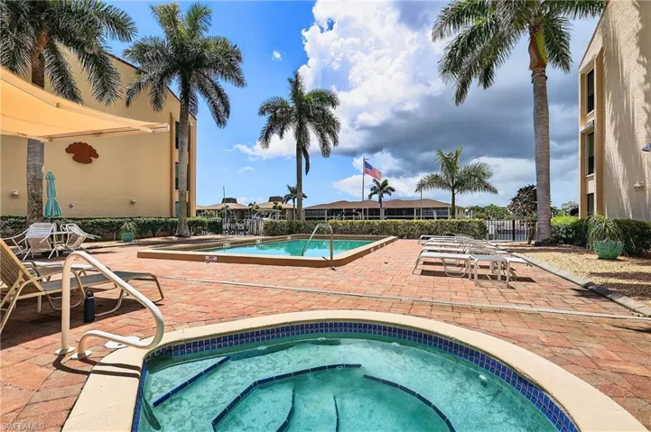 Community pool also has a spa/hot tub