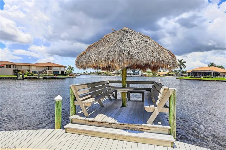 Can you picture yourself sitting out under the tiki hut with an evening cocktail right on the water? All I can say is WELCOME to Paradise!