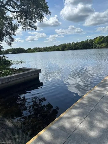 Dock featuring a water view