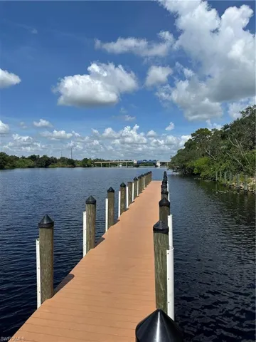 Dock featuring a water view