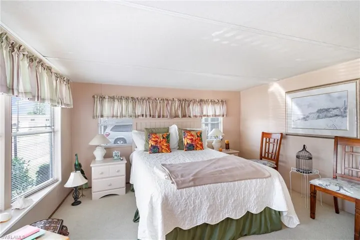 Bedroom with carpet flooring