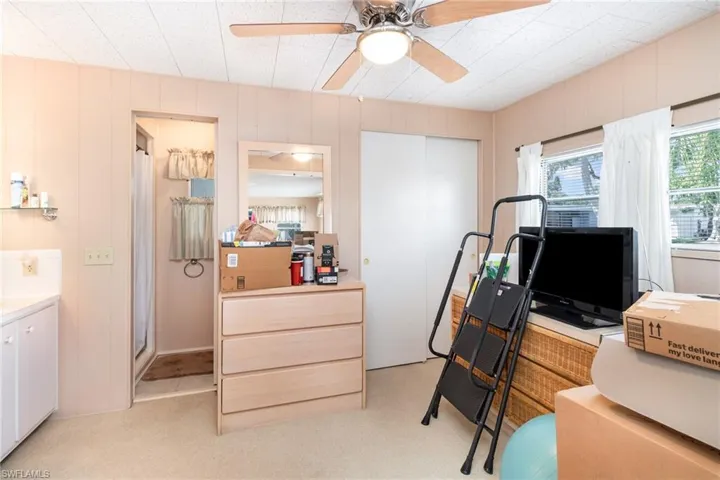 Bedroom featuring a ceiling fan