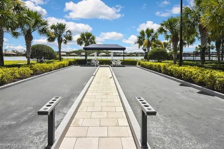 View of asphalt road featuring a water view