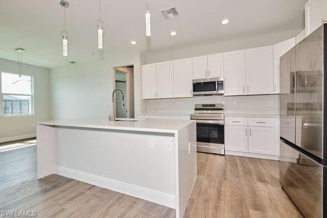 1104 NW 15th  ST, Cape Coral, FL 33993