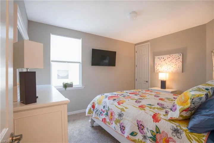 Bedroom featuring carpet flooring