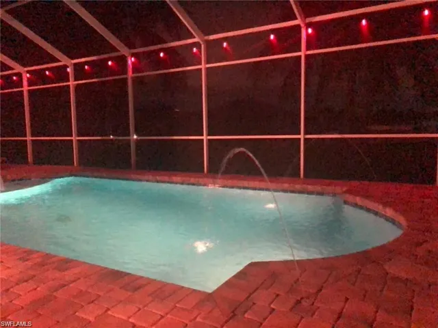 View of pool featuring pool water feature