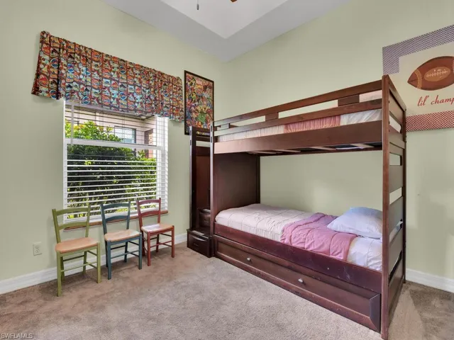 Bedroom featuring carpet flooring