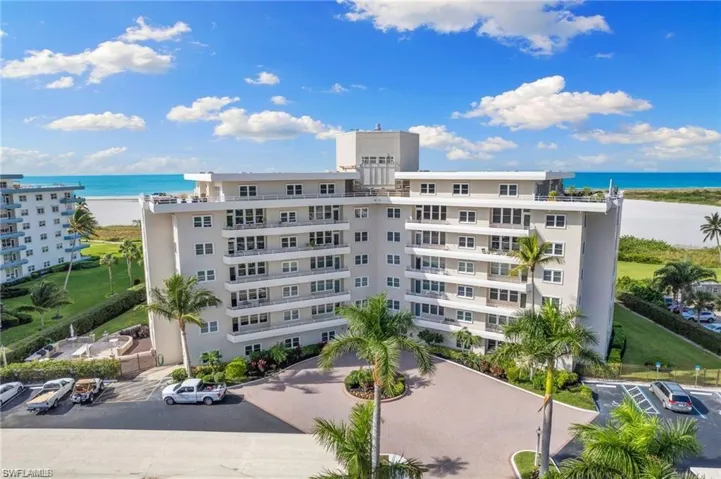 View of building exterior featuring a water view