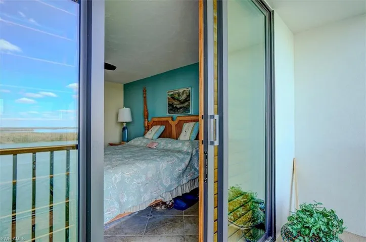 VIEW FROM SCREENED LANAI INTO OWNER'S SUITE
