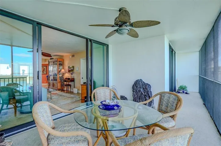 VIEW FROM LANAI INTO MAIN LIVING AREA.  EXTENDED LANAI HAS DIRECT ENTRANCE TO OWNER'S SUITE (AT REAR RIGHT).