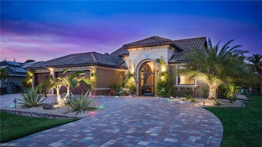 Professional Landscape Lighting adorns your Grand Circular Driveway to please the illumination enthusiest!