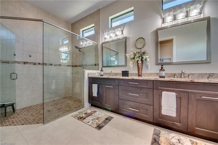 New Lighting above Vanity, large walk in shower.