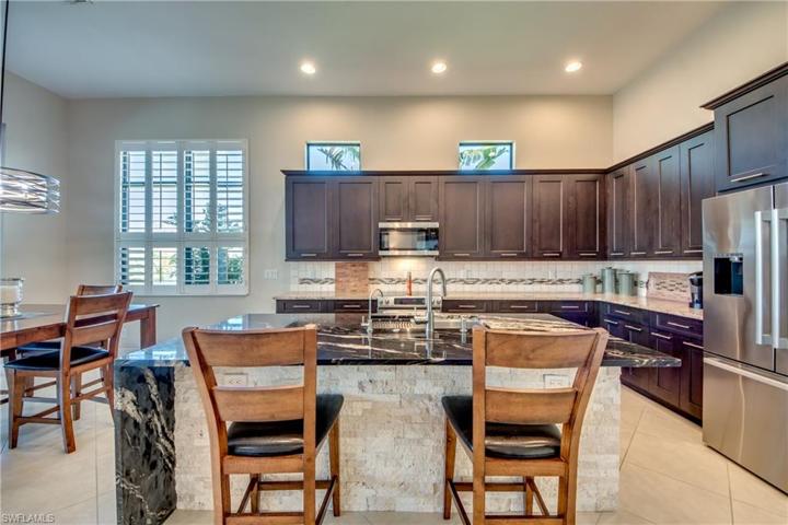Clear Story Windows above cabinets are new and impact Glass