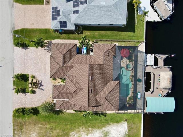 Your Footprint of your Paradise Playground maintained to perfection and the envy of all !!  This desired Northern Exposure home was built for the outdoor enthusiast.  The expansive deck around the pool, builds the pool away from the house to bring sunshine on the pool all day and shade to the under truss lanai all day.