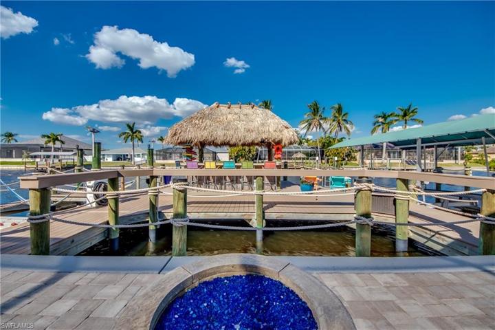 Your Pavered Firepit overlooks your Mini Lagoon.  The Dock has Double Roped Custom Roping Around Dock