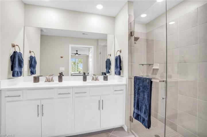 Main Bath with custom Glass Door & Shelving