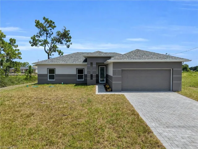 Lovely Brand New Canal Side 3 Bedroom (Plus Private Home Office/Den/Or 4th Bedroom) 2 Bathroom/2 Car Garage Home In Lehigh Acres, FL!