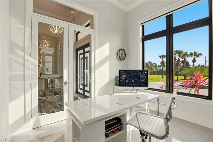Office area featuring french doors